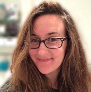 Emily Cooper is a smiling forty-something woman with long brown hair and glasses. She would like you to hire her please.